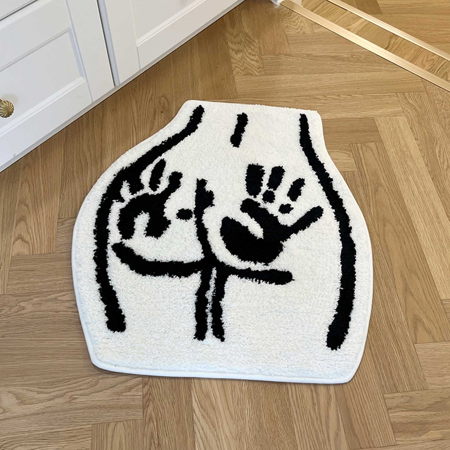 Tufted Rug Handprint on Booty Rug Front in a Living Room