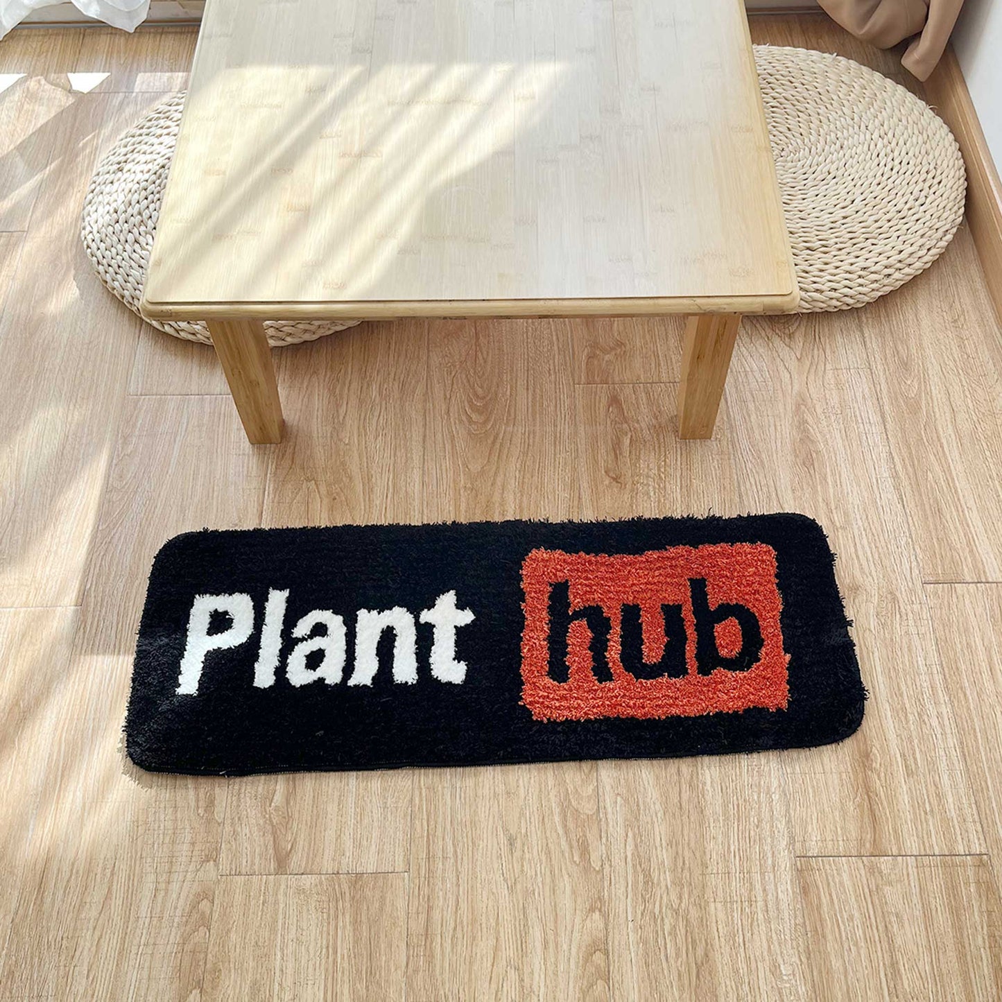 Tufted Rug Plant Hub Rug Front Under a Table