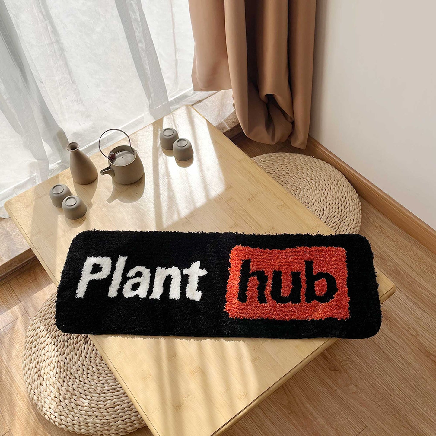 Tufted Rug Plant Hub Rug Front on a Table
