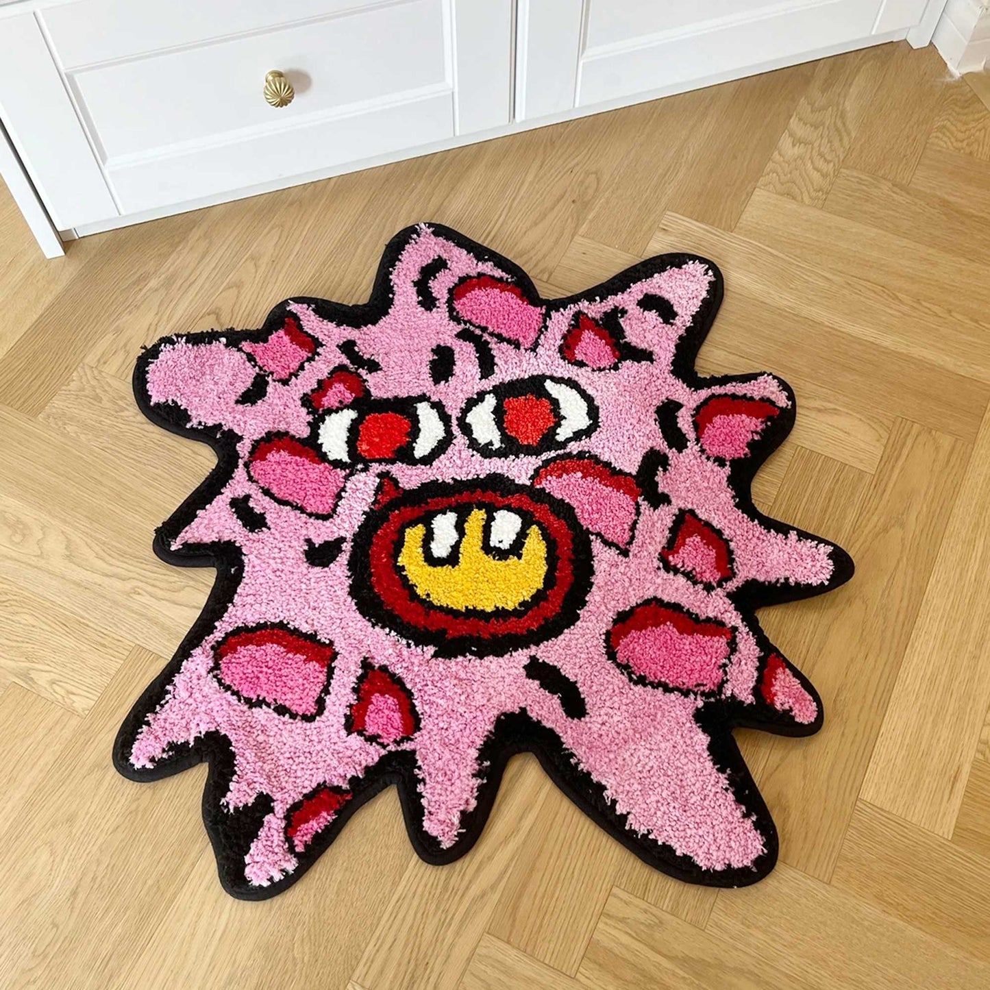 Tufted Rug Tyler the Creator Splattered Cherry Bomb Rug Front in a Bedroom