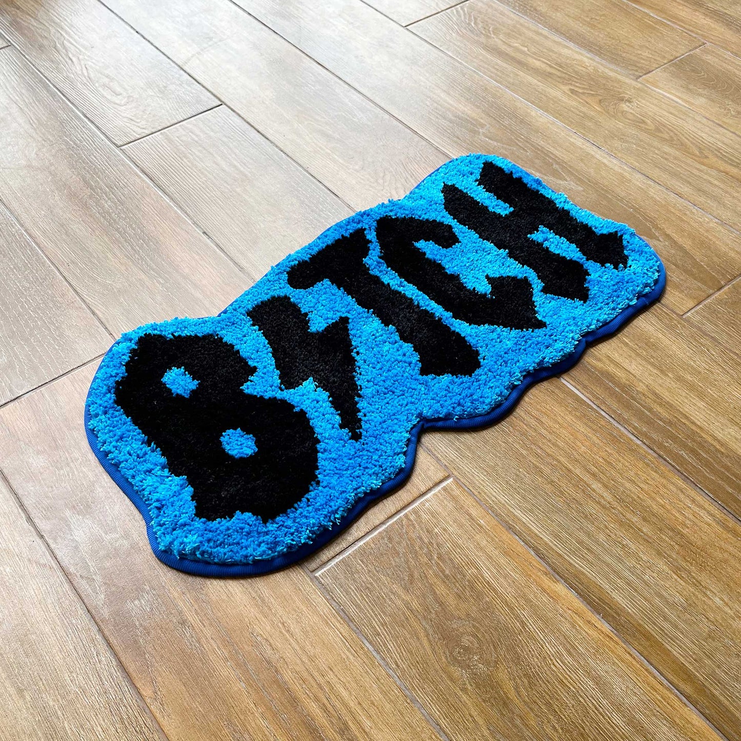 Tufted Rug Blue Bitch Rug Side View
