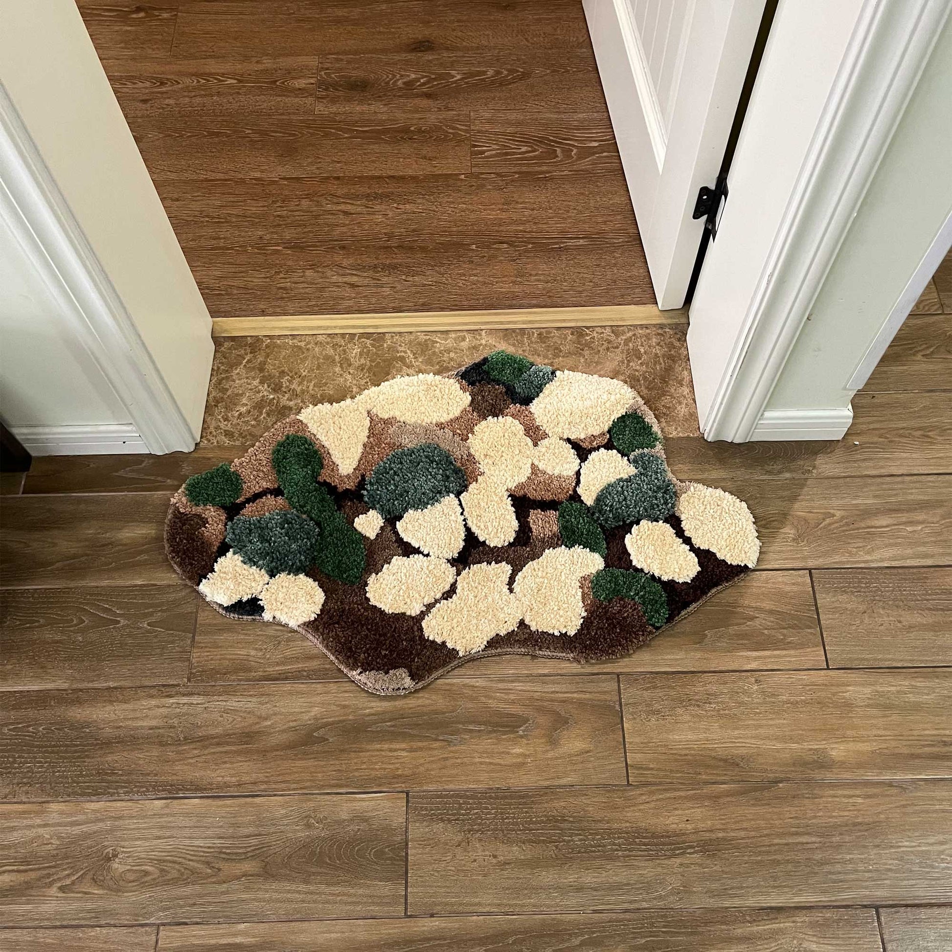 Tufted Rug Brown Natural Moss Rug Front in an Entryway
