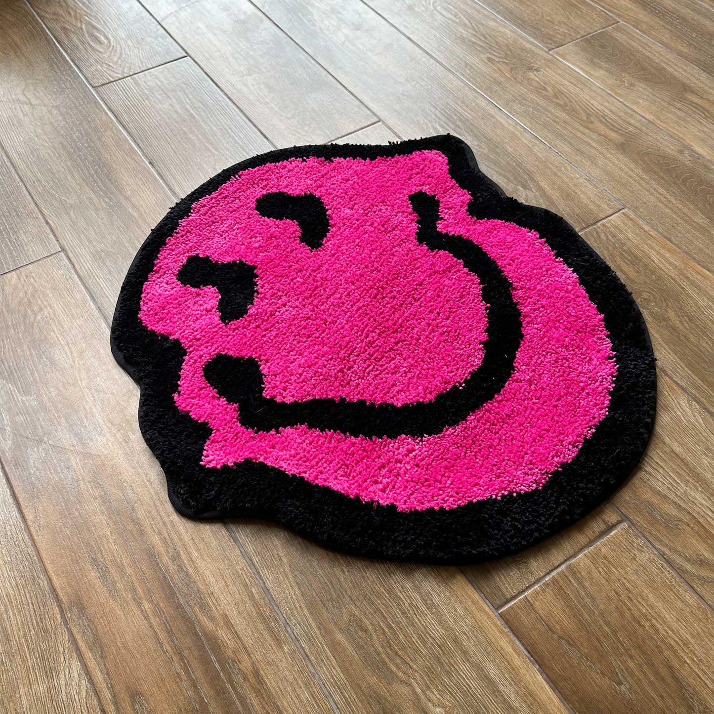 Tufted Rug Pink Wavy Smiley Face Rug Front Diagonal
